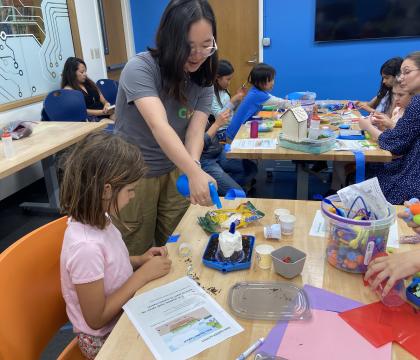 Summer 2024 Fellow participating in a rain garden event held by Climate Resilient Communities