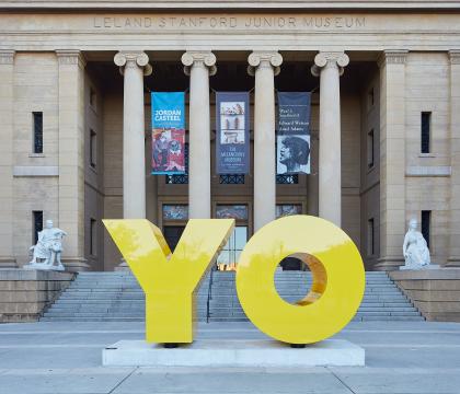 OY/YO Sculpture by Deborah Kass in front of Cantor Arts Center