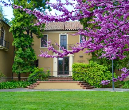 Bechtel International Center building with purple flowers