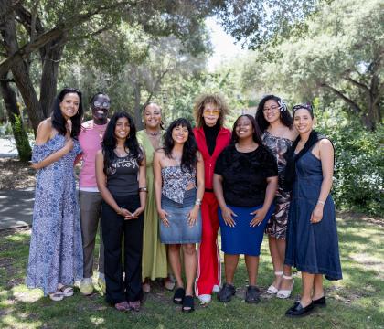 Group of students with Jennifer McHenry, mother of Lyric McHenry the namesake of the program. 