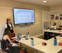 A student giving presentation on feminist, gender, and sexuality studies 