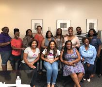 Black Diaspora Fellow Taylor Crutison in a group photo with colleagues from her summer fellowship