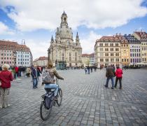 Tourists wander the streets of Dresden.